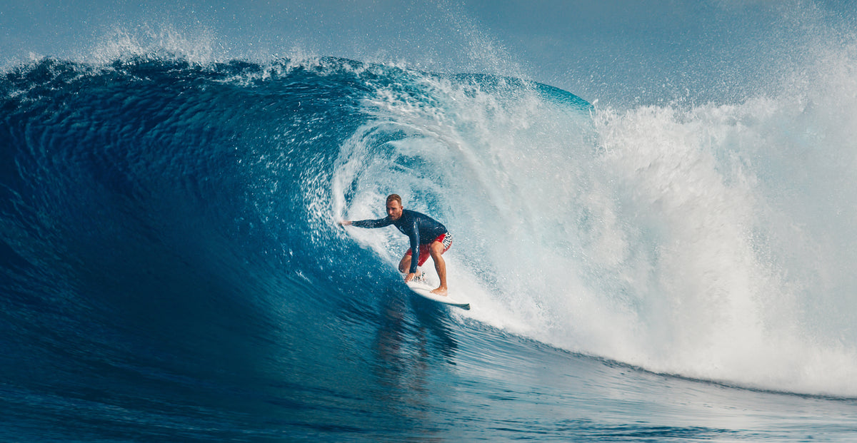 A surfer riding a wave